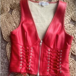 Red leather IAMGIA set has tie detail and rhinestones red belt attached to pants